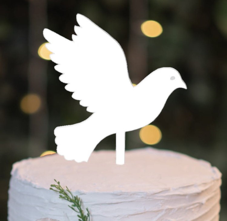 Biały gołąb na tort okolicznościowy