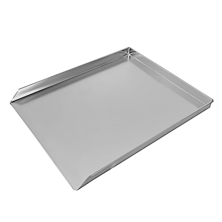 Otwarta metalowa blacha do pieczenia ciastek