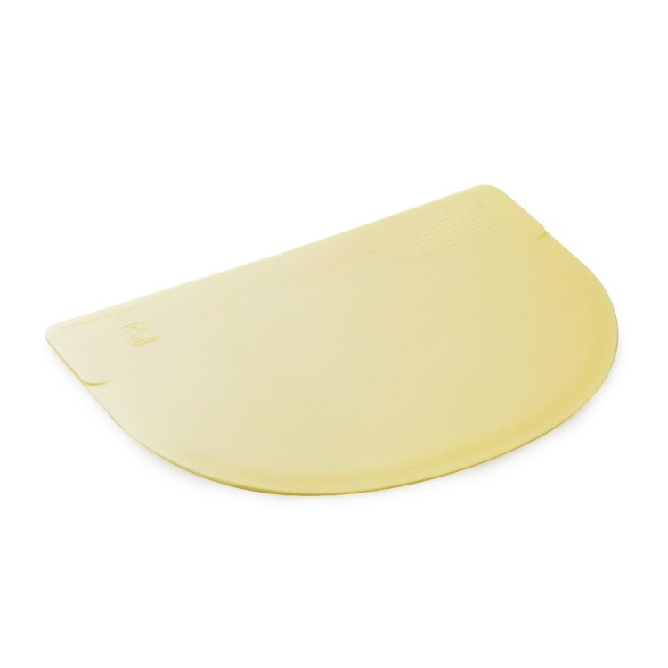 Żółty okrągły skrobak cukierniczy do dekoracji i rozprowadzania mas