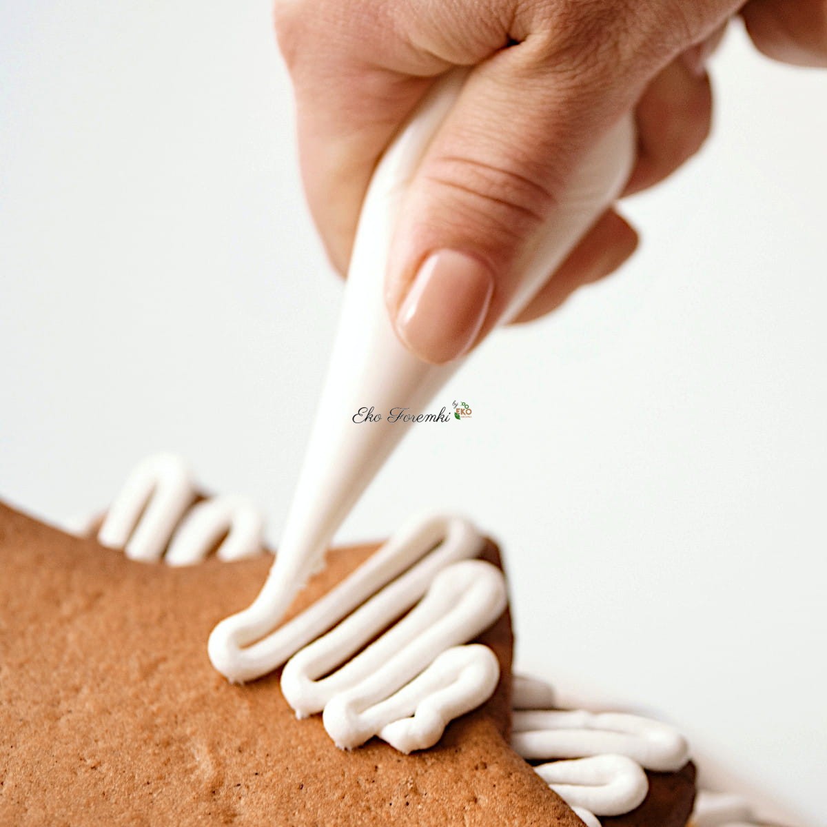 Dekorowanie pierniczków przy użyciu worka cukierniczego Thermohauser