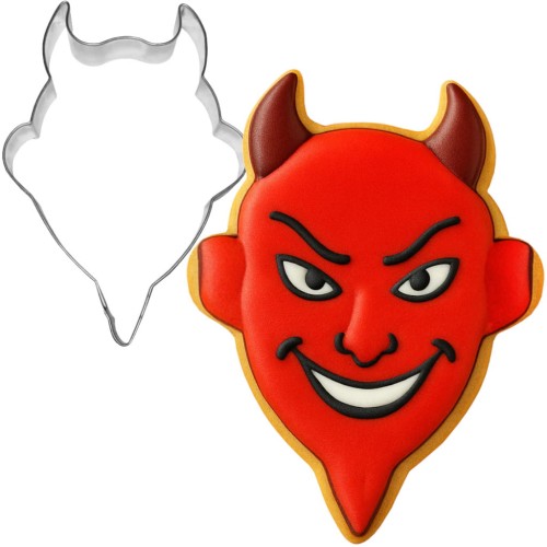 Foremka głowa diabła i udekorowane lukrem ciasteczko