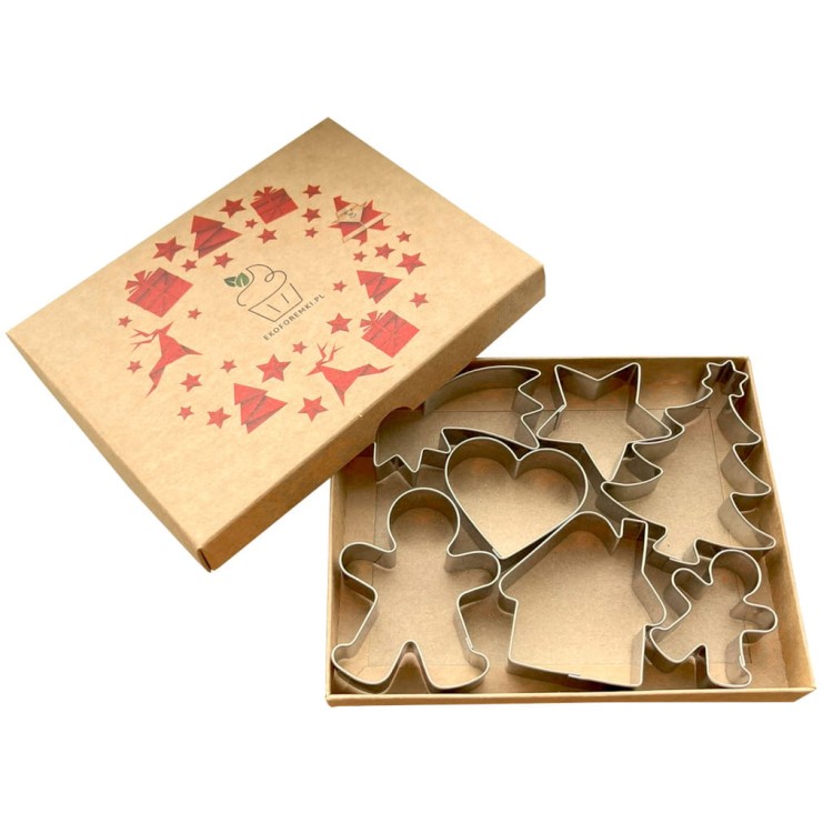 Foremki ze stali nierdzewnej: gwiazda betlejemska, ciastek mały i duży, domek, serce, gwiazdka i choinka z gwiazdką – ułożone w kartonowym pudełku prezentowym