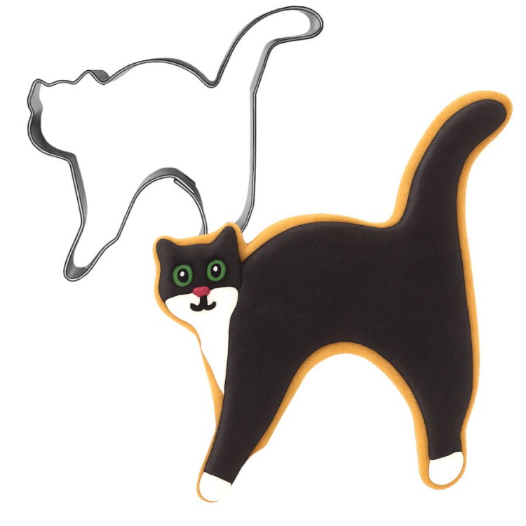 foremka w kształcie kota z wygiętym grzbietem i udekorowane lukrem ciasteczko