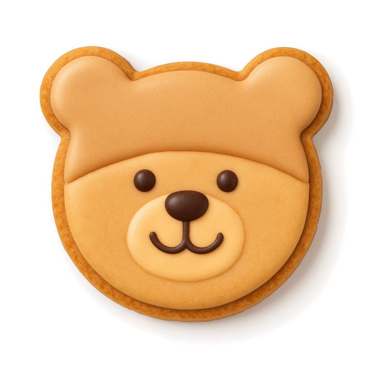 Ciasteczko w kształcie misia udekorowane lukrem w kształcie buzi misia