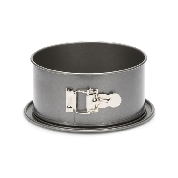 Okrągła metalowa forma do pieczenia Patisse Carat z klamrą i średnicą 18 cm.