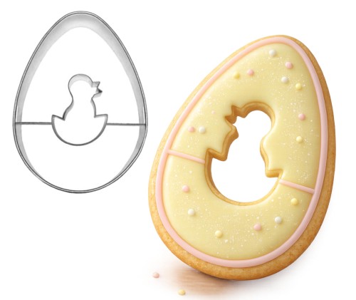 foremka jajko z otworkiem w kształcie pisklęcia oraz ciasteczko udekorowane lukrem