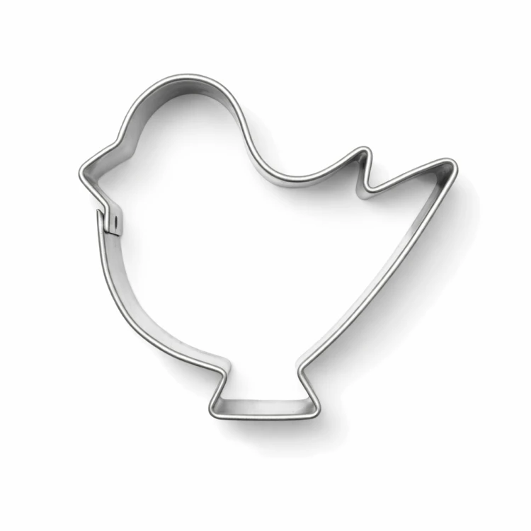 Metalowa foremka w kształcie ptaszka wykonana ze stali ocynowanej