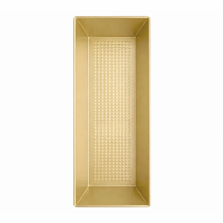 Metalowa keksówka z fakturowanym dnem w kolorze złotym