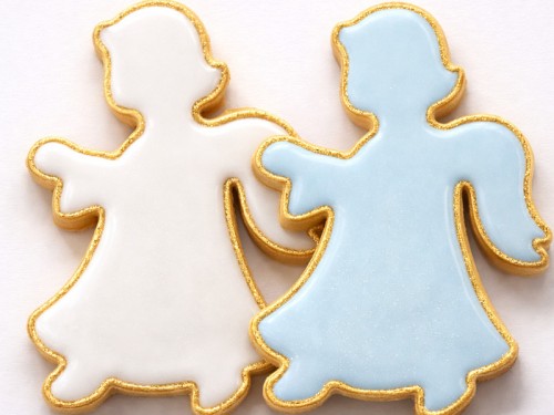 ciasteczka aniołki pokryte pastelowym lukrem