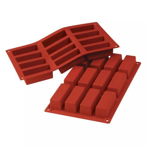 Silikonowa forma Silikomart Mini Cake z prostokątnymi zagłębieniami do przygotowywania monoporcji, pokazana na jasnym tle.